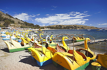 Pedaloes on beach, Copacabana, Lake Titicaca, Bolivia, South America