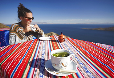 Cocoa leaf tea at outdoor cafe on Isla del Sol (Island of the Sun), Lake Titicaca, Bolivia, South America