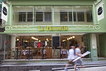 People walking past French bistro, Soho, Central, Hong Kong, China, Asia