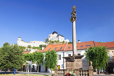 Monument in Mierove Square and Trencin Castle, Trencin, Trencin Region, Slovakia, Europe 