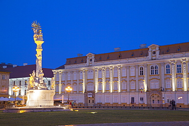 Baroque Palace and Trinity Column in Piata Unirii at dusk, Timisoara, Banat, Romania, Europe 