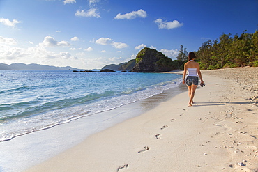 Woman walking on Furuzamani Beach, Zamami Island, Kerama Islands, Okinawa, Japan, Asia 