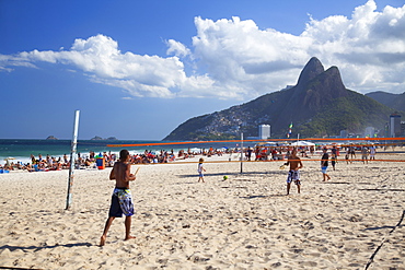 People playing tennis on Ipanema beach at dawn, Rio de Janeiro, Brazil, South America