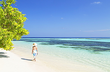 Woman on beach, Rasdhoo Island, Northern Ari Atoll, Maldives, Indian Ocean, Asia