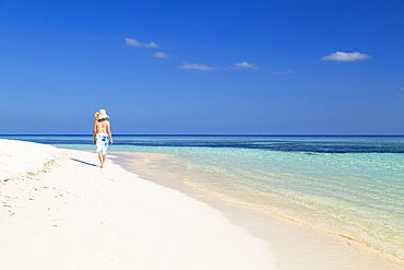 Woman on beach, Rasdhoo Island, Northern Ari Atoll, Maldives, Indian Ocean, Asia