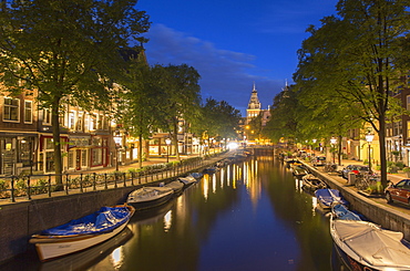 Spiegelgracht canal and Rijksmuseum at dusk, Amsterdam, Netherlands, Europe