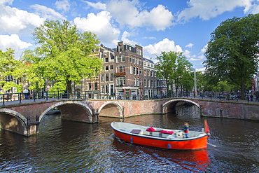 Boat on Prinsengracht canal, Amsterdam, Netherlands, Europe