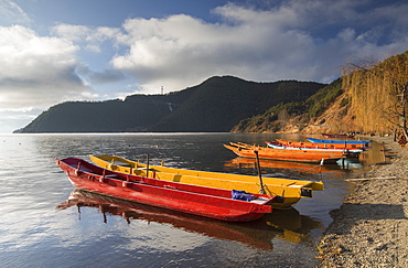 Boats on Lugu Lake, Lige village, Yunnan, China, Asia