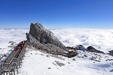 Tourists on Jade Dragon Snow Mountain (Yulong Xueshan), Lijiang, Yunnan, China, Asia