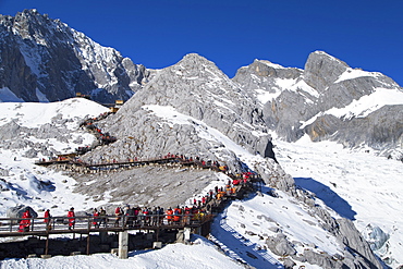 Tourists on Jade Dragon Snow Mountain (Yulong Xueshan), Lijiang, Yunnan, China, Asia