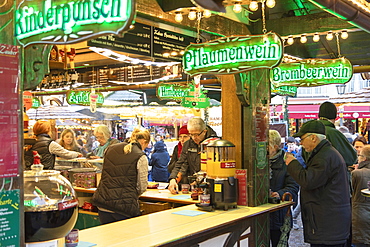 People at German mulled wine stall at Frankfurt Christmas Market, Frankfurt am Main, Hesse, Germany, Europe