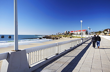 Couple walking along Humewood beachfront, Port Elizabeth, Eastern Cape, South Africa, Africa