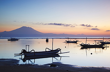 Boats on Sanur beach at dawn, Bali, Indonesia, Southeast Asia, Asia