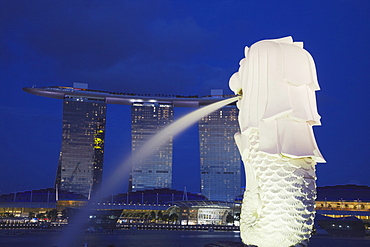 The Merlion statue and Marina Bay Sands Hotel at dusk, Singapore, Southeast Asia, Asia