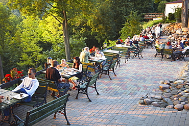 People sitting on patio at Tores Restaurant, Uzupis District, Vilnius, Uzupis District, Lithuania, Baltic States, Europe