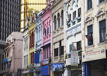 Traditional Chinese shophouses and modern skyscraper, Chinatown, Kuala Lumpur, Malaysia, Southeast Asia, Asia