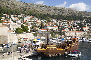 Old Harbor with vintage looking tourist boat, Dubrovnik, Croatia, Europe