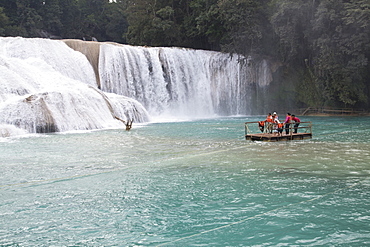 Churning cascades and tourists on raft, Rio Tulija, Parque Nacional de Agua Azul, near Palenque, Chiapas, Mexico, North America