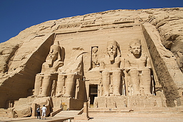 Tourists enjoying the site, Colossi of Ramses II, Sun Temple, Abu Simbel, UNESCO World Heritage Site, Egypt, North Africa, Africa