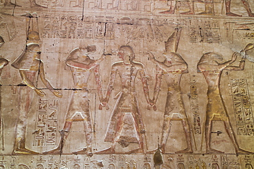 Bas-relief of Pharaoh Seti I in center with Egyptian Gods, Temple of Seti I, Abydos, Egypt, North Africa, Africa