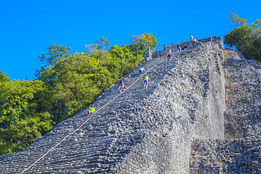 Tourists climbing the temple, Nohoch Mul Temple, Coba, Quintana Roo, Mexico, North America