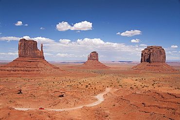 Monument Valley Navajo Tribal Park, Park Road (foreground), West and East  Utah, United States of America, North America