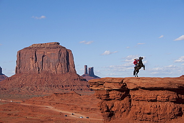 Monument Valley Navajo Tribal Park, view from John Ford's Point, Navajo Man on Horse, Utah, United States of America, North America