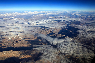 The Zanskar Range of the Indian Himalaya seen from the air, looking north west towards the western Karakorum mountains and K2 in the distance, India, Asia