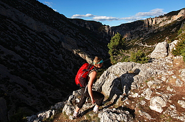 Woman hiking in the Mascun Gorge, one of Europe's most popular canyoning destinations, Sierra de Guara mountains, Aragon, Spain