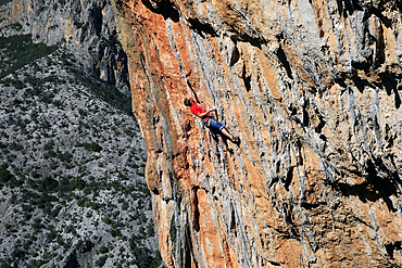 Rock climber in action at Leonidio, north-eastern Peloponnese, Greece