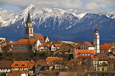 St. Cantianus Church in the foreground and the Kamnik Alps behind, Kranj, Slovenia, Europe