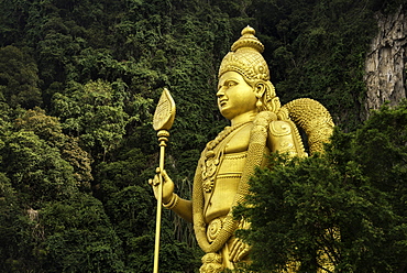 Statue of Hindu God, Lord Muruganat, at the entrance to the Batu Caves, Gombak, Malaysia, Southeast Asia, Asia