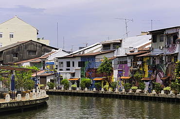 Colourful murals on houses along the Melaka River in Melaka (Malacca), Malaysia, Southeast Asia, Asia