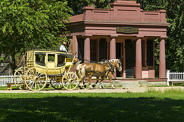 Horse drawn stagecoach at Old Sturbridge Village, a living history museum depicting early New England life from 1790 to 1840 in Sturbridge, Massachusetts, New England, United States of America, North America