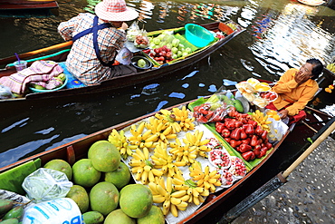 Thai woman selling fruit at floating market, Bangkok, Thailand, Southeast Asia, Asia