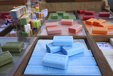 Different types of soap on stall in a street market on the French Riviera, Provence, France, Europe