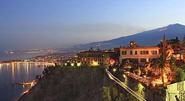 View from Taormina at dusk of coast and Mount Etna, Sicily, Italy, Europe