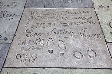 Hand and foot prints of Gene Autry, Manns (Graumans) Chinese Movie Theatre, Hollywood Boulevard, Los Angeles, California, United States of America, North America