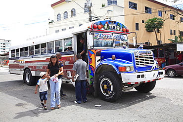 Public buses, referred to locally as Diablos Rojos (Red Devils), Panama City, Panama, Central America