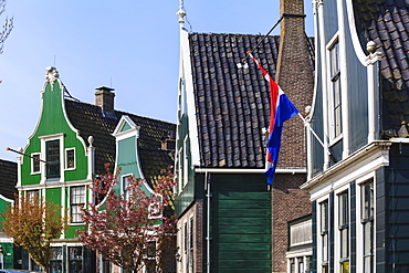 Preserved historic houses in Zaanse Schans, a village on the banks of the River Zaan, near Amsterdam, a tourist attraction and working museum, Zaandam, North Holland, Netherlands, Europe 