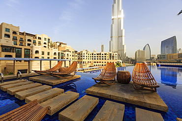 Burj Khalifa seen from hotel swimming pool, Dubai, United Arab Emirates, Middle East