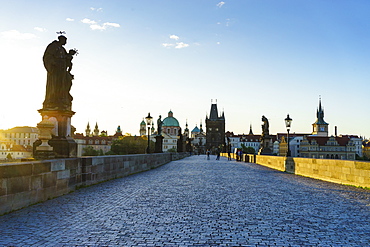 Early morning on Charles Bridge looking towards the Old Town, UNESCO World Heritage Site, Prague, Czech Republic, Europe