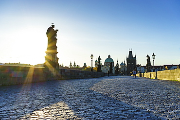 Early morning on Charles Bridge looking towards the Old Town, UNESCO World Heritage Site, Prague, Czech Republic, Europe