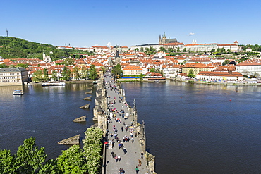 High angle view of Charles Bridge looking towards the Castle District, Royal Palace and St. Vitus's Cathedral, UNESCO World Heritage Site, Prague, Czech Republic, Europe