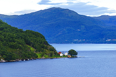 Small houses on Storfjord (Storfjorden), Norway, Scandinavia, Europe