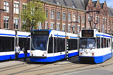 Centraal Station and trams, Amsterdam, Netherlands, Europe