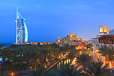 Burj Al Arab viewed from the Madinat Jumeirah Hotel at dusk, Jumeirah Beach, Dubai, United Arab Emirates, Middle East