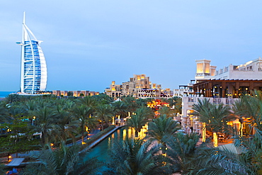 Burj Al Arab and Madinat Jumeirah Hotels at dusk, Dubai, United Arab Emirates, Middle East