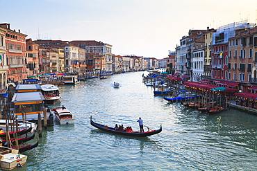 A gondola crossing the Grand Canal, Venice, UNESCO World Heritage Site, Veneto, Italy, Europe