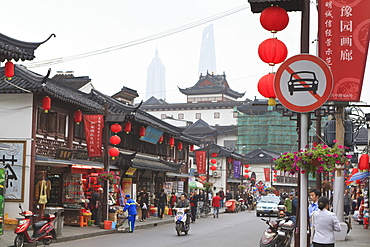 Pedestrians and traffic on Shanghai Old Street, remnant of a bygone age, Fuxing, Shanghai, China, Asia